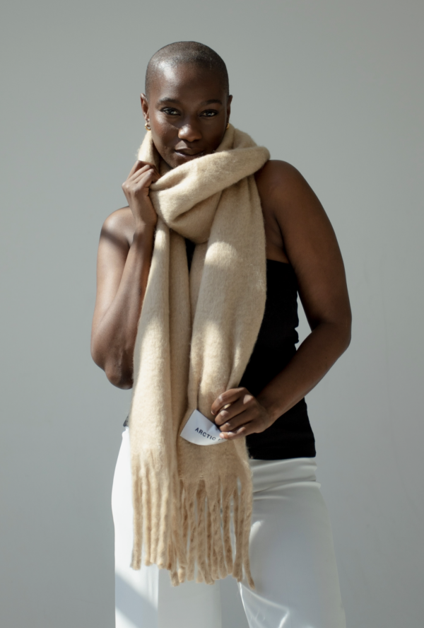 Sustainable Scarf Recycled Fashion Eco-friendly Accessories Luxurious Warmth XL Silhouette Scarf Beige Fringed Scarf Brushed Texture Scarf Winter Fashion Staple Exceptional Insulation Scarf Skin Tone Complementing Scarf Stylish Winter Wrap Environmentally Conscious Fashion Sustainable Style Statement Green Fashion Choice Earth-Friendly Elegance Ethical Winter Wear Trendy Recycled Scarf Warmth with Purpose Sustainable Chic Scarf Fashionable Planet-Friendly Scarf